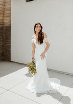 Lace sweetheart strapless sheath wedding gown
