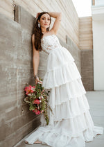 Multi-tiered a-line wedding dress with floral corset bodice