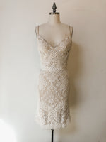 Ivory lace over nude fitted midi dress