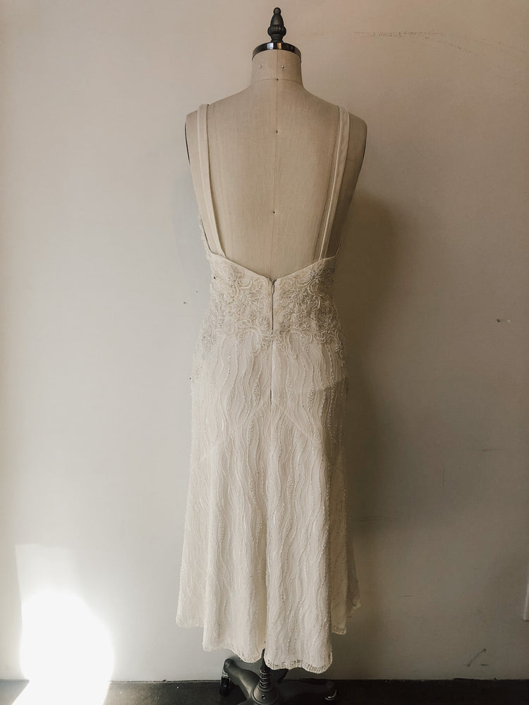 Fully beaded lace tea length dress