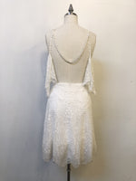 Boho geometric lace and beaded flutter sleeve mini dress